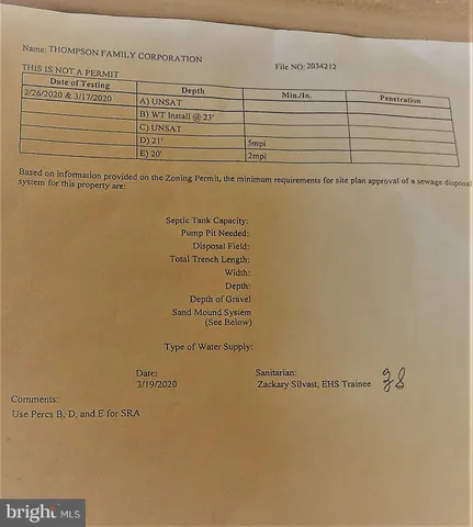 a picture of a door with a tree in the background