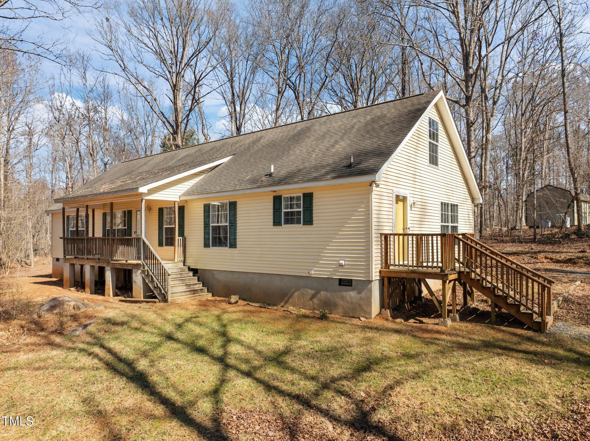 180 Carolina Ridge Road Pittsboro, NC 27312 - Photo 2 of 42 Secluded home on 1.8 Acres