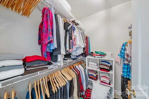 a view of a chairs and table in the balcony