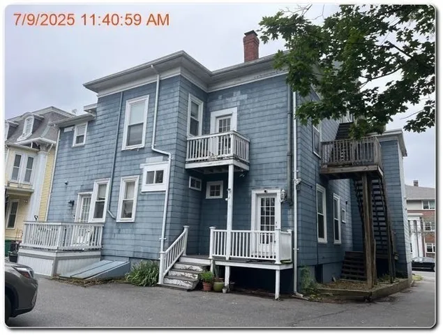 a front view of a house with a garage