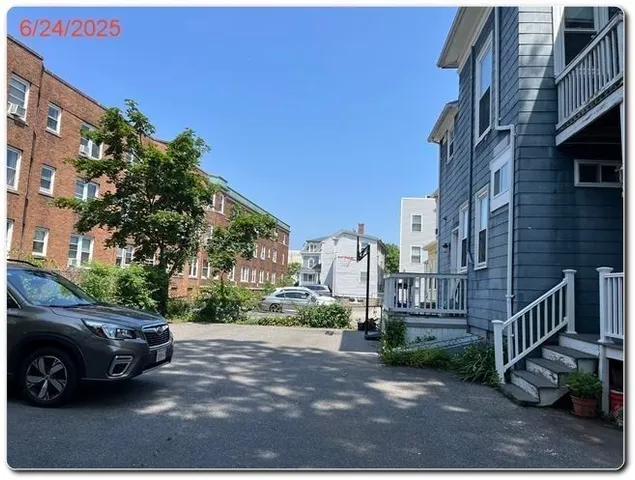 a view of a street in front of a building