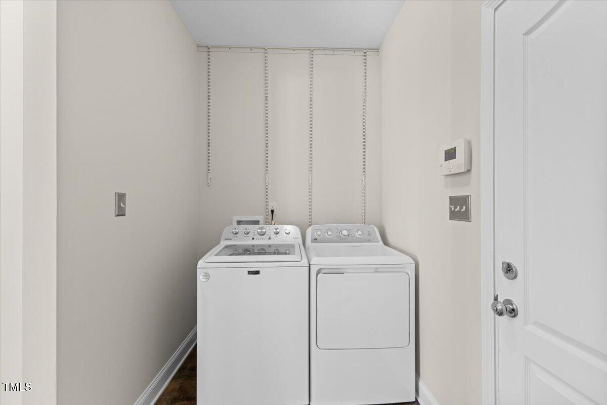 166 Old Field Loop Sanford, NC 27332 - Photo 20 of 50 a utility room with dryer and washer