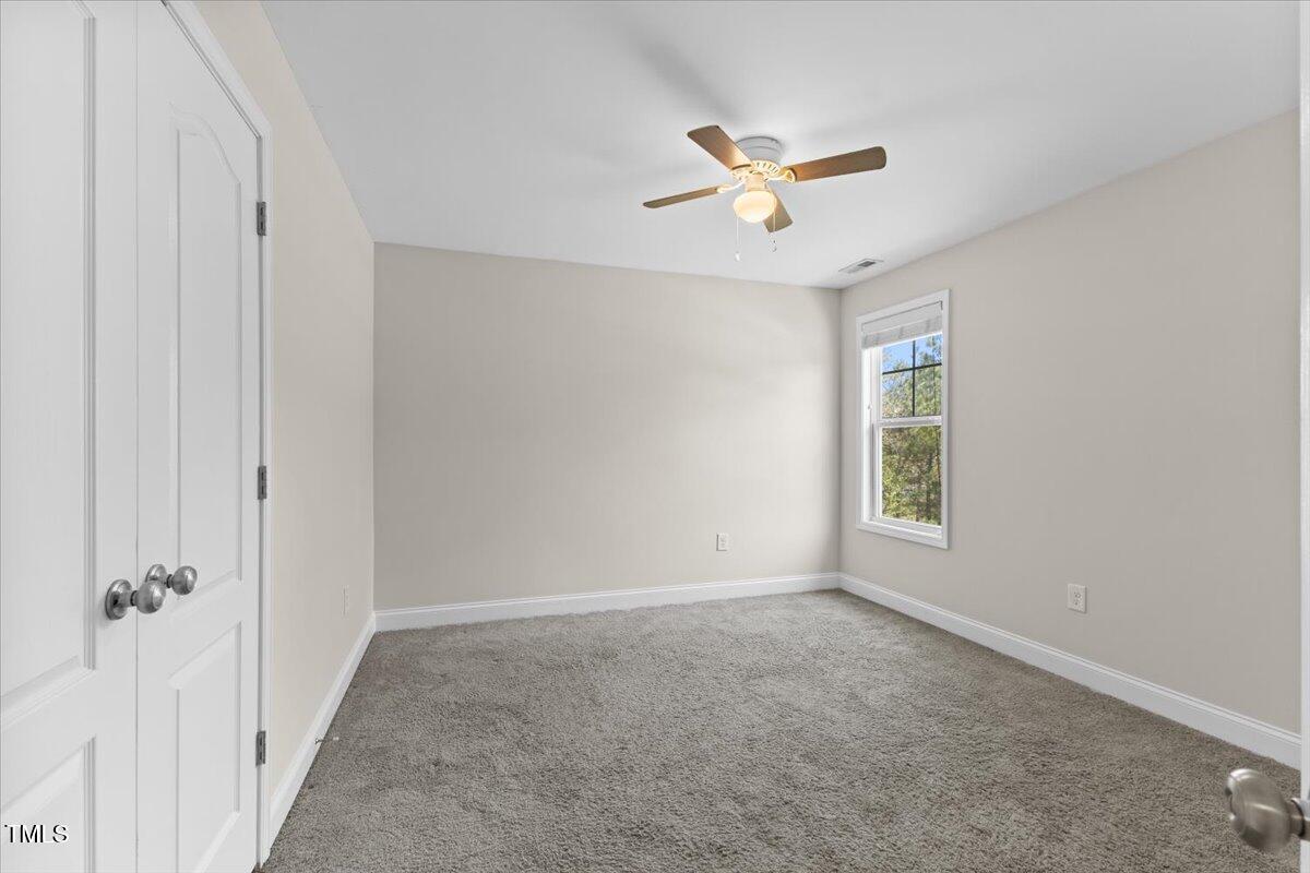 166 Old Field Loop Sanford, NC 27332 - Photo 39 of 50 a view of a livingroom with a window