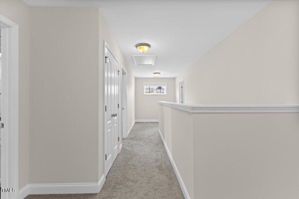 166 Old Field Loop Sanford, NC 27332 - Photo 41 of 50 a view of a hallway with front door