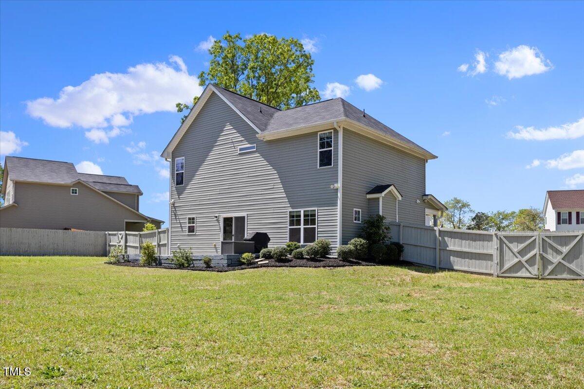 166 Old Field Loop Sanford, NC 27332 - Photo 46 of 50 a house view with a outdoor space