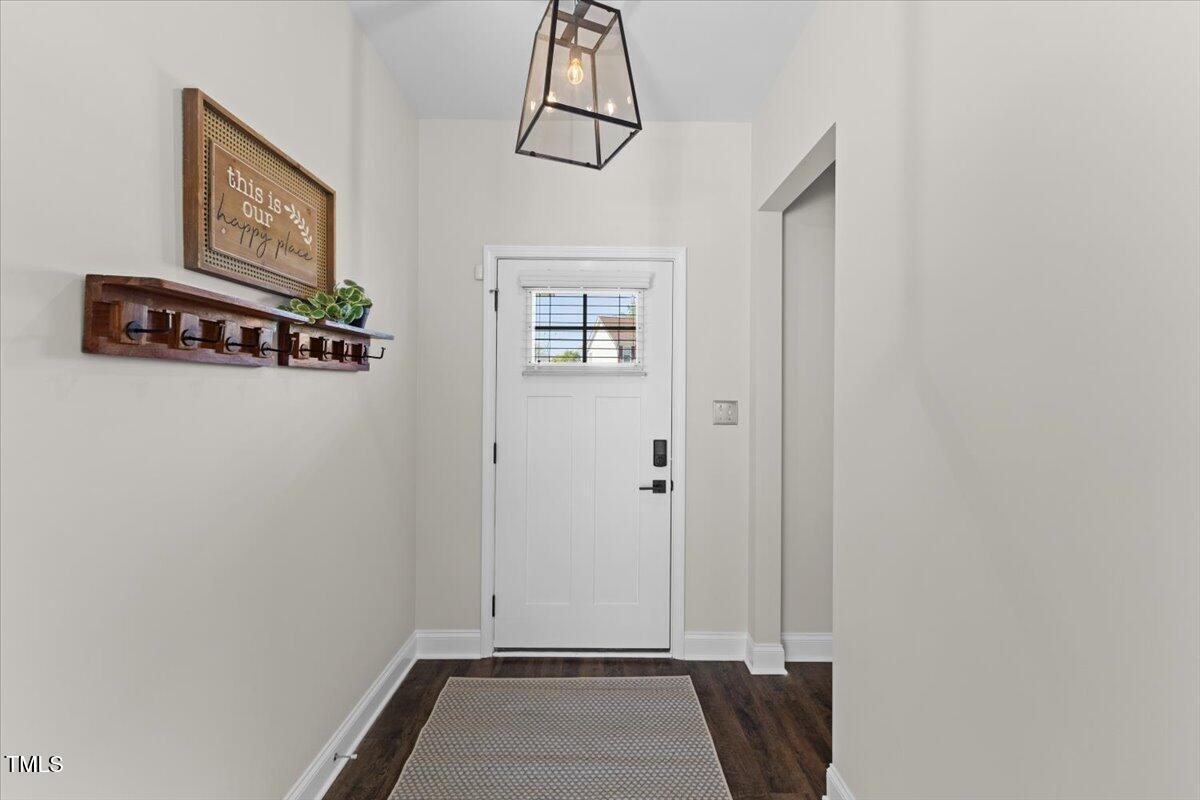 166 Old Field Loop Sanford, NC 27332 - Photo 6 of 50 a view of an entryway with wooden floor