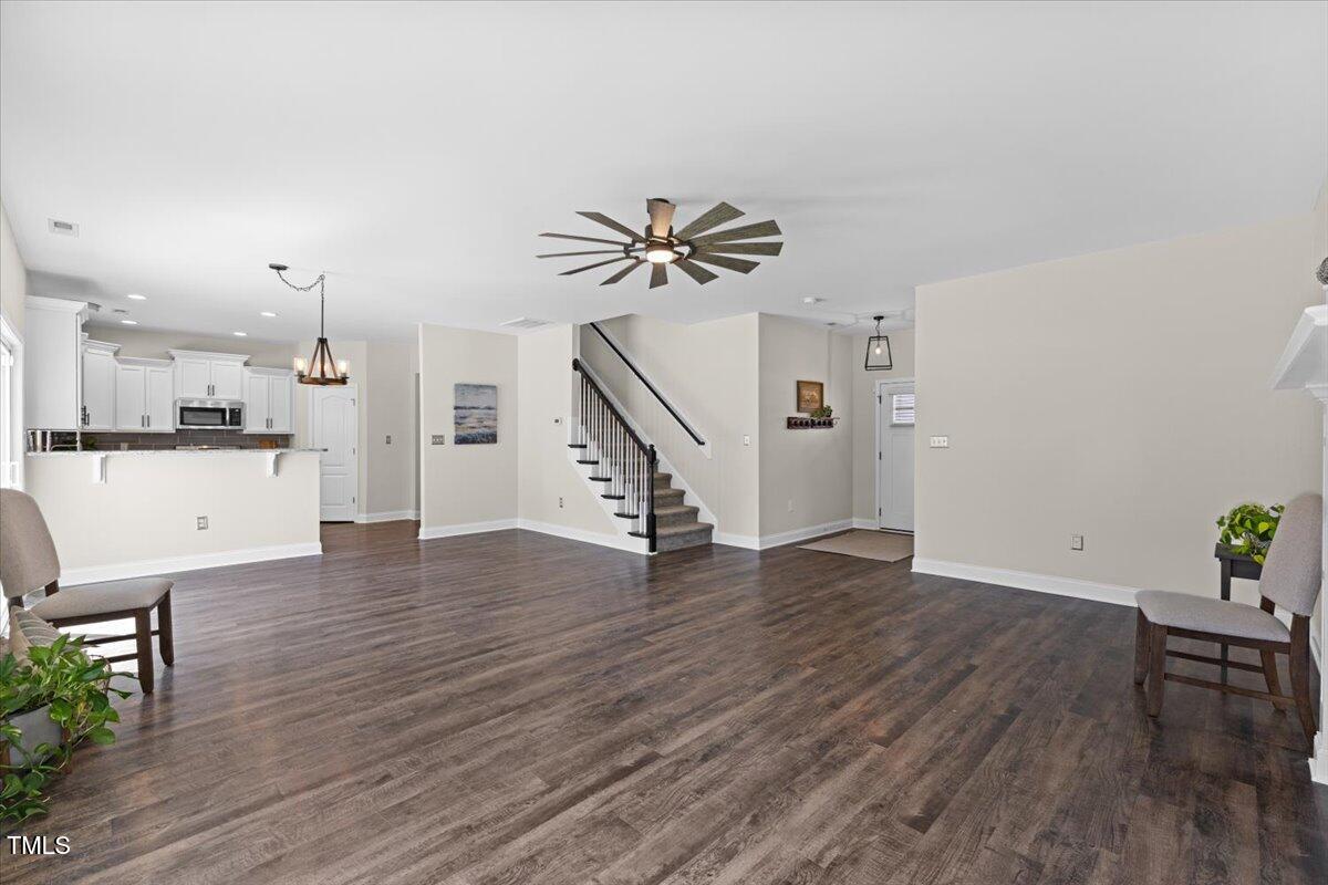 166 Old Field Loop Sanford, NC 27332 - Photo 9 of 50 a view of a livingroom with furniture and wooden floor