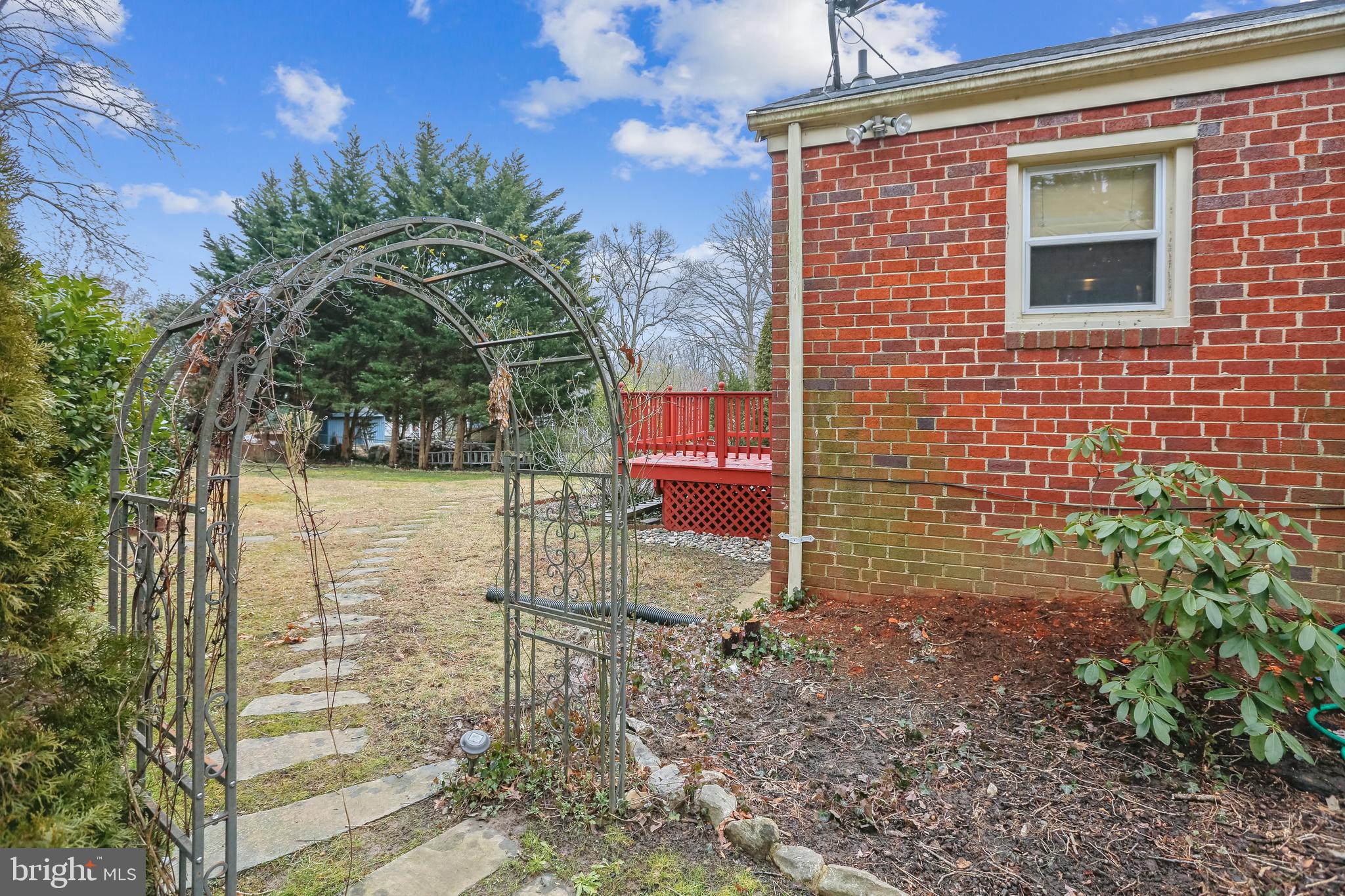 Lovely Arbor  leading to the Beautiful Backyard