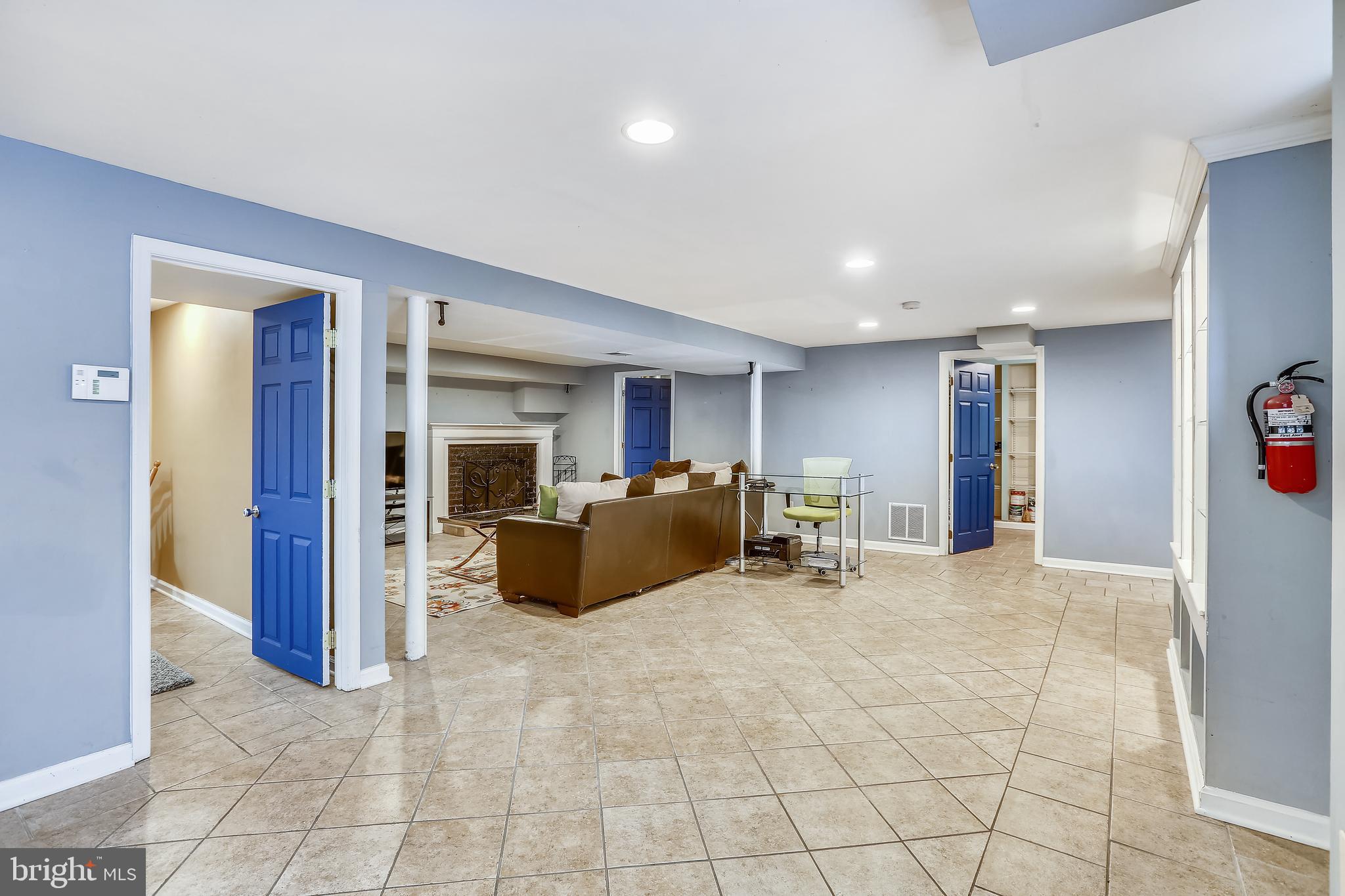 8917 Walden Road Silver Spring, MD 20901 - Photo 23 of 29 Lower level Family with Fireplace