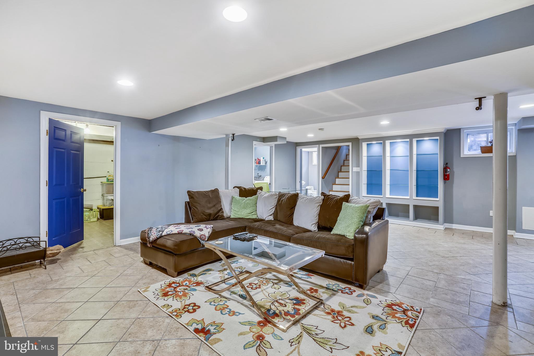 8917 Walden Road Silver Spring, MD 20901 - Photo 25 of 29 Lower Level Family room with built in shelves