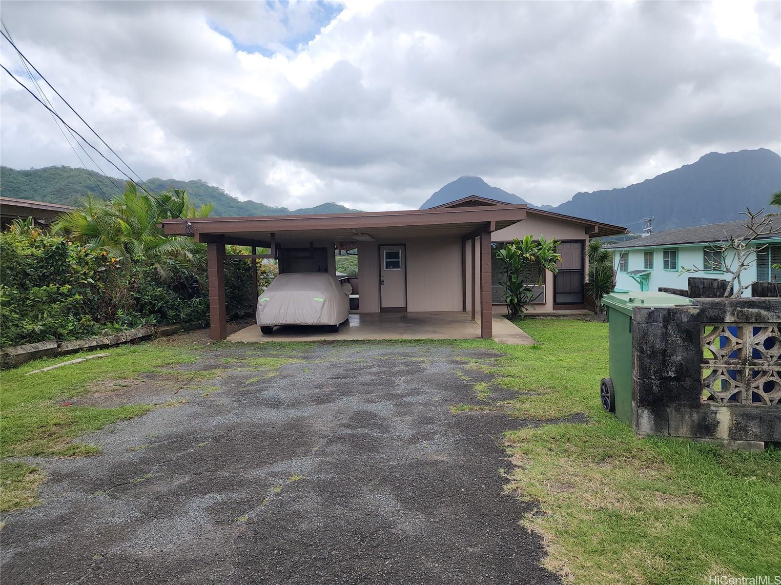 45-038 Waikalua Road Kaneohe, HI 96744 - Photo 1 of 16 a front view of a house with garden
