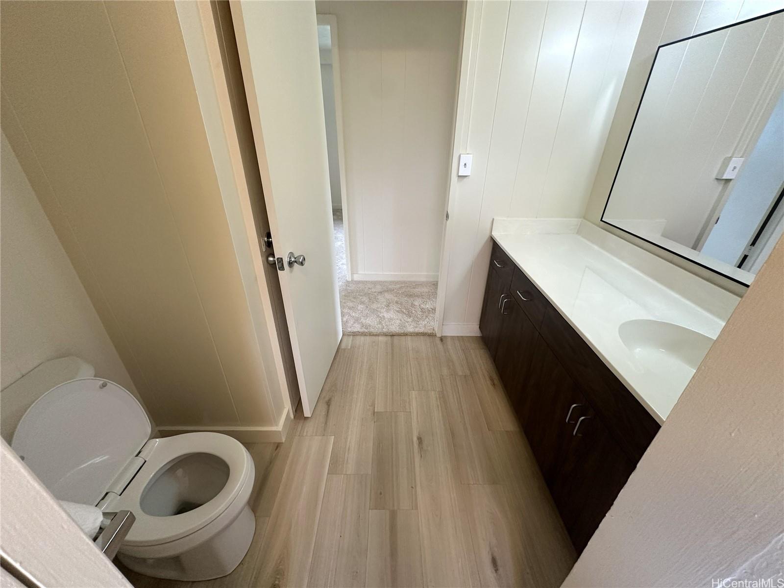 45-038 Waikalua Road Kaneohe, HI 96744 - Photo 13 of 16 a bathroom with a sink and a mirror