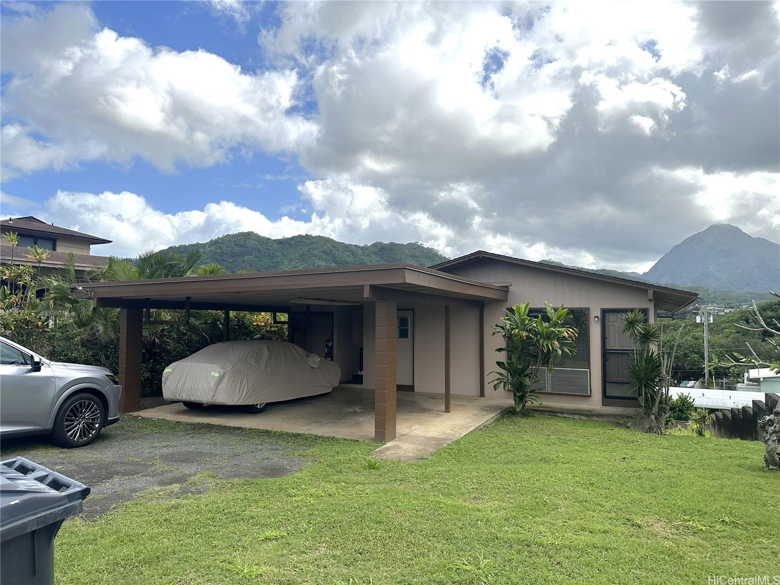 45-038 Waikalua Road Kaneohe, HI 96744 - Photo 2 of 16 a front view of a house with garden
