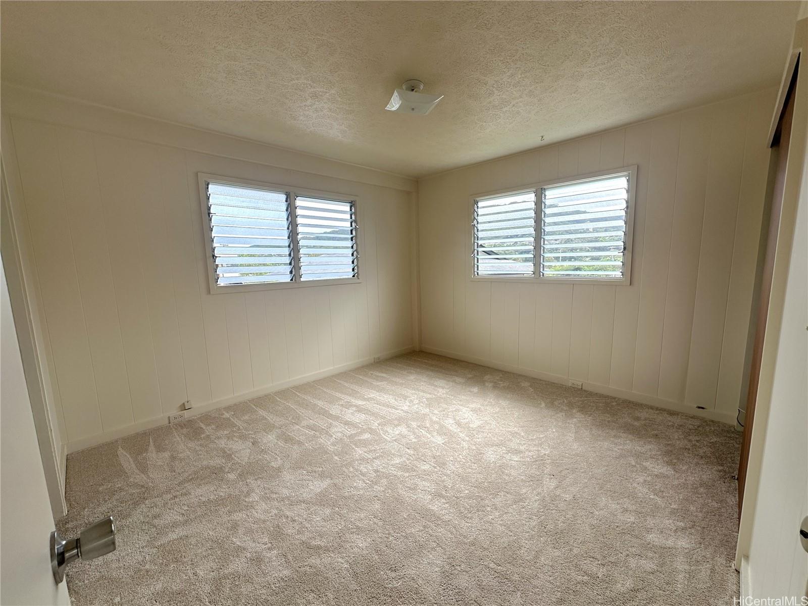 45-038 Waikalua Road Kaneohe, HI 96744 - Photo 8 of 16 an empty room with a window