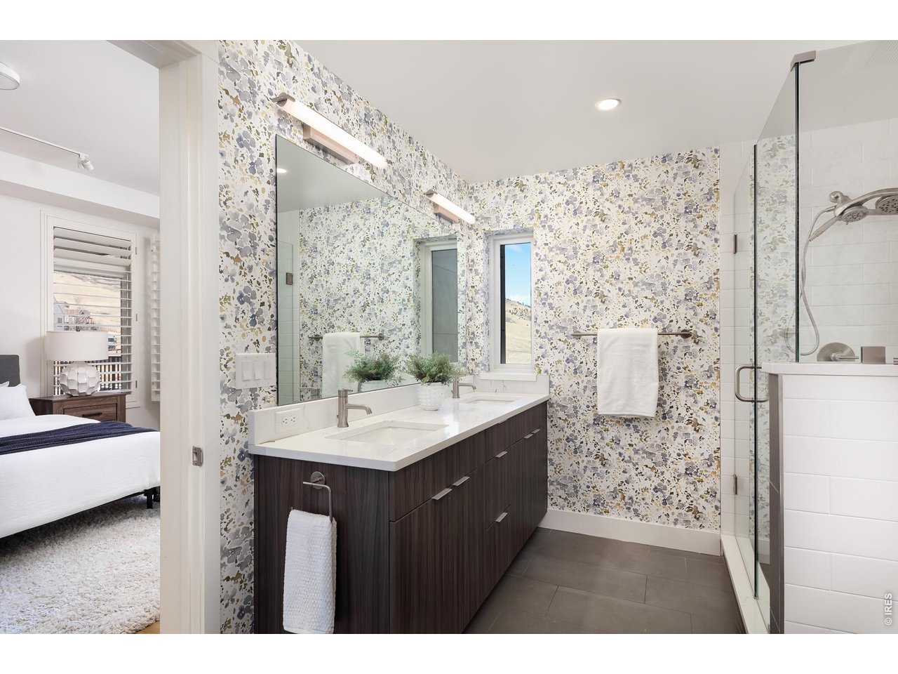 650 Terrace Avenue, Unit E Boulder, CO 80304 - Photo 16 of 44 a bathroom with a sink mirror and a shower