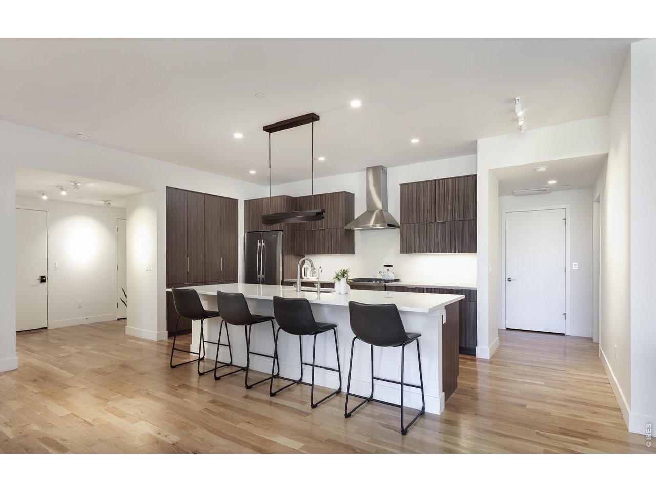 650 Terrace Avenue, Unit E Boulder, CO 80304 - Photo 44 of 44 a kitchen with a table and chairs