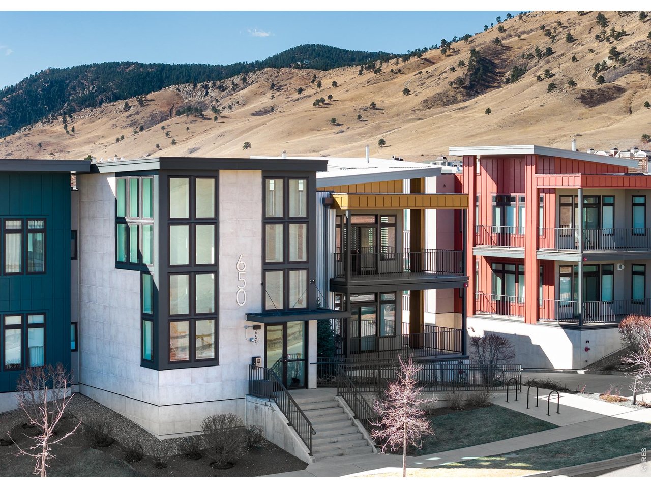 650 Terrace Avenue, Unit E Boulder, CO 80304 - Photo 8 of 44 a front view of a building with a garden