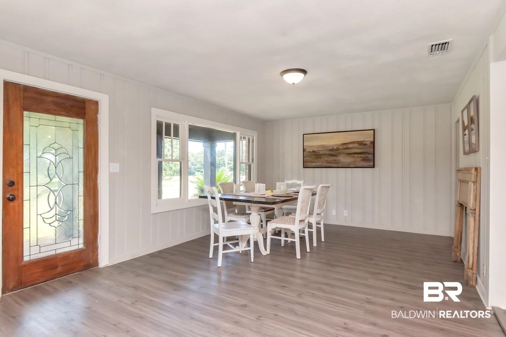 1334 Leroy Stevens Road Mobile, AL 36695 - Photo 10 of 46 Dining room with wood finished floors