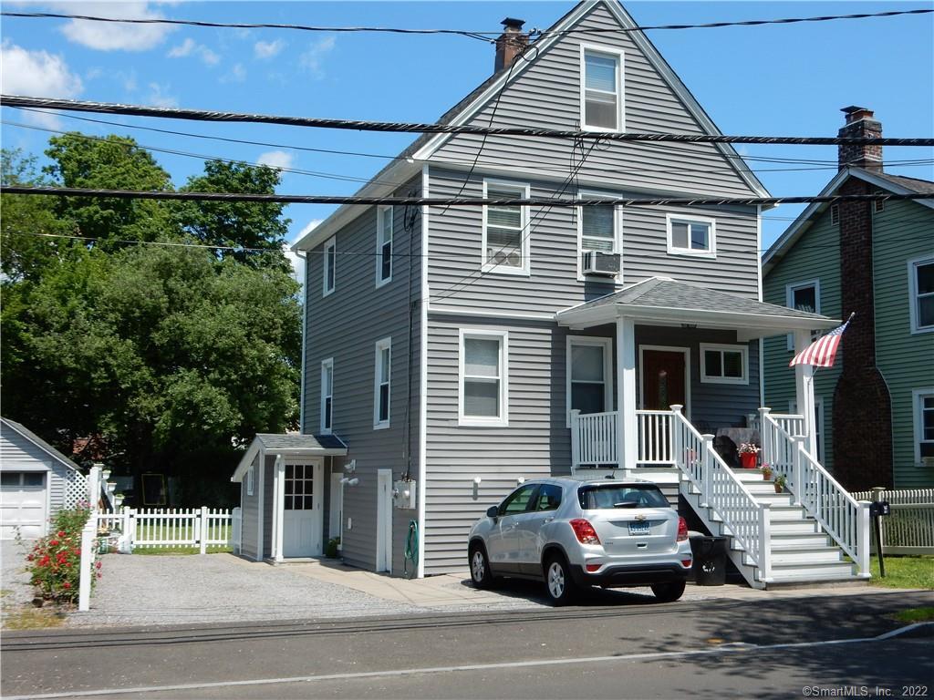 a car parked in front of a house
