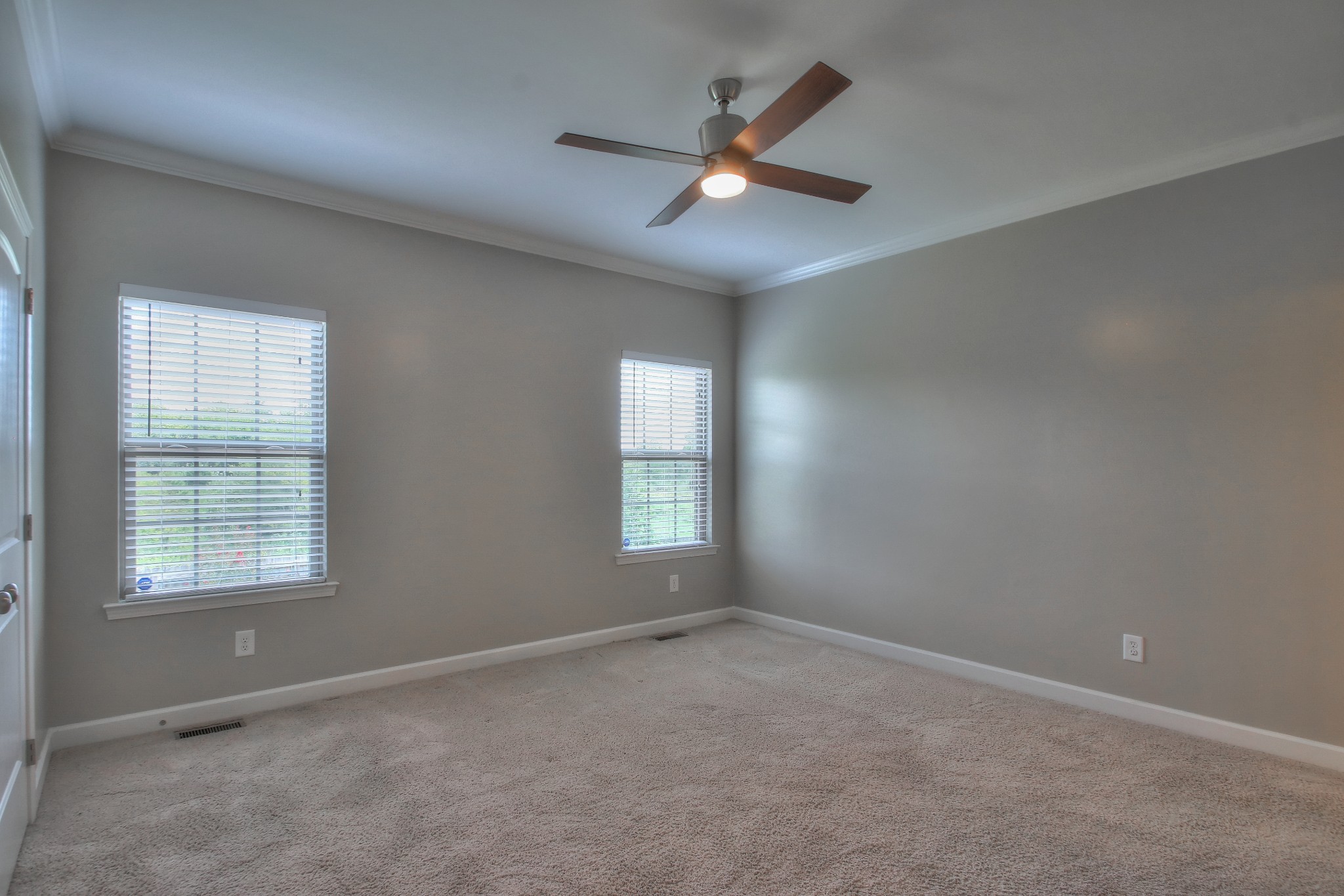 2025 Lincoln Road Spring Hill, TN 37174 - Photo 27 of 37 an empty room with a window and a fan