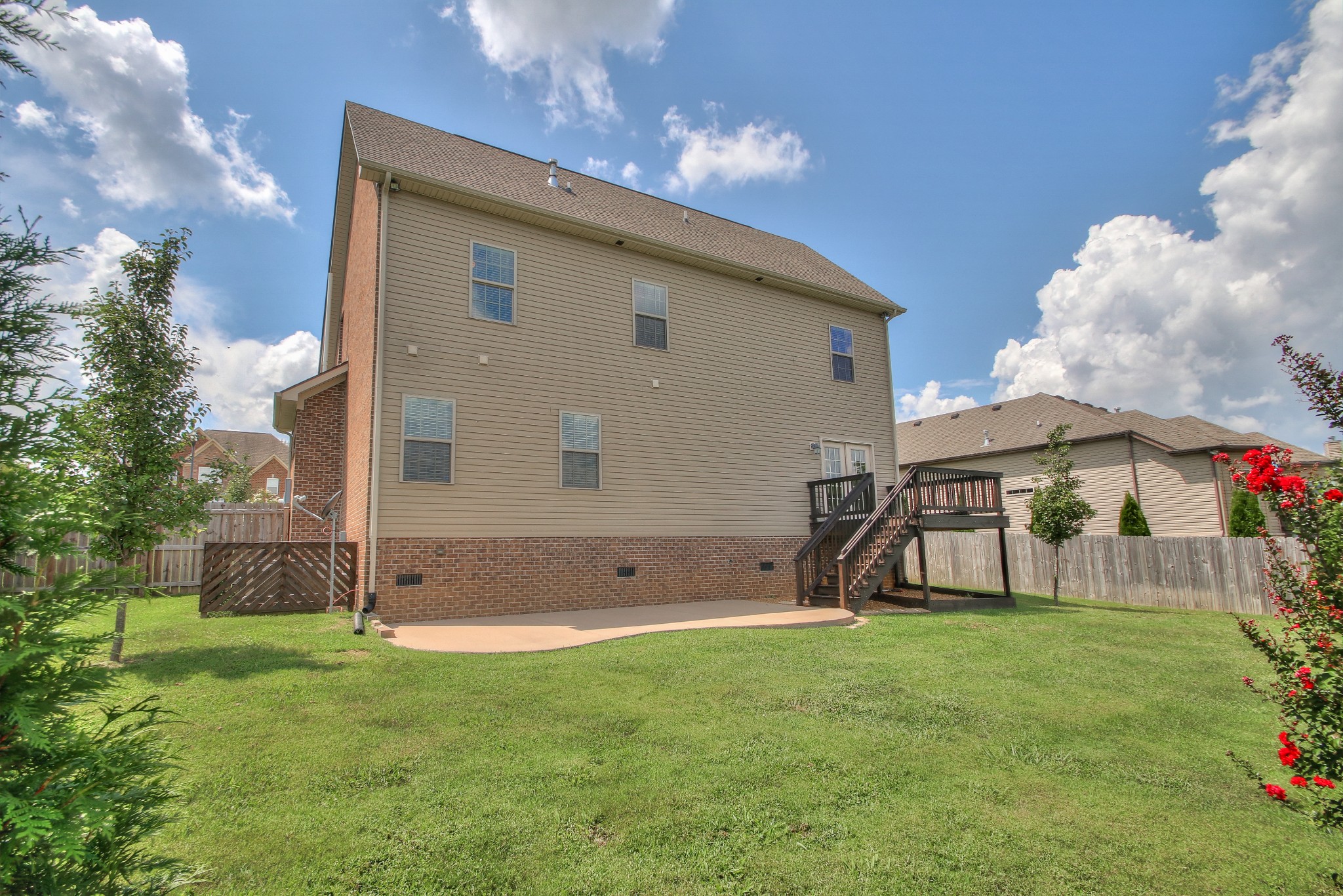 2025 Lincoln Road Spring Hill, TN 37174 - Photo 36 of 37 a view of backyard with a garden and entertaining space