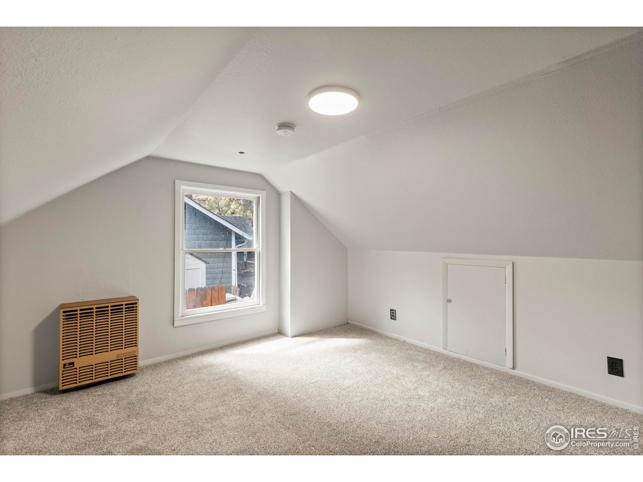 2387 West W Highway Drake, CO 80515 - Photo 22 of 29 a view of an empty room with a window