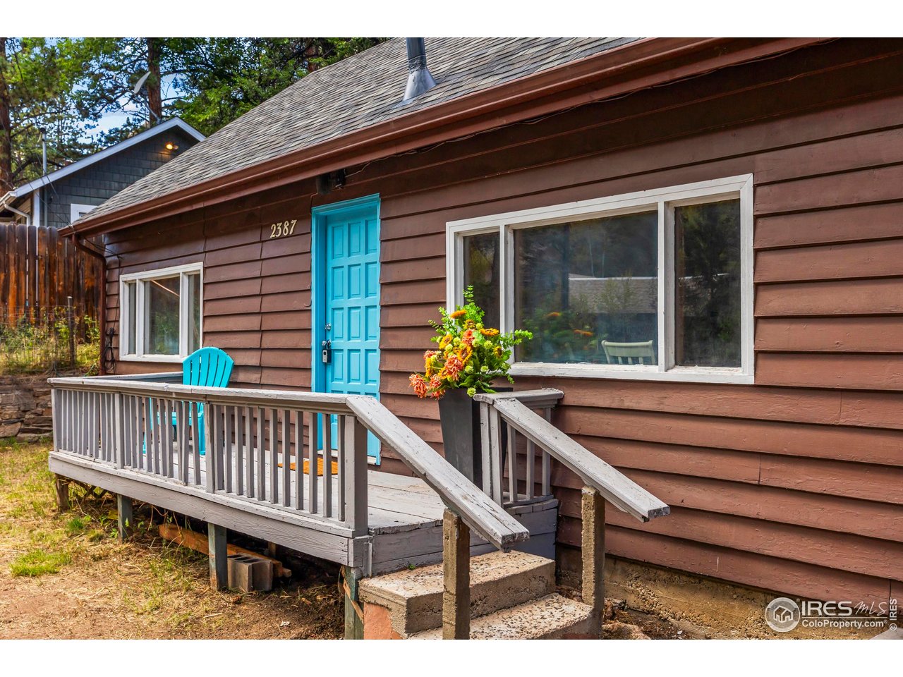 2387 West W Highway Drake, CO 80515 - Photo 5 of 29 a view of a wooden deck with a bench