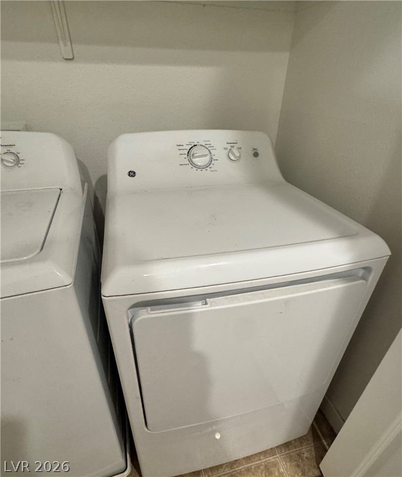 1892 Via Del Rey Court Las Vegas, NV 89115 - Photo 9 of 10 A dedicated laundry space featuring essential appliances for everyday convenience.