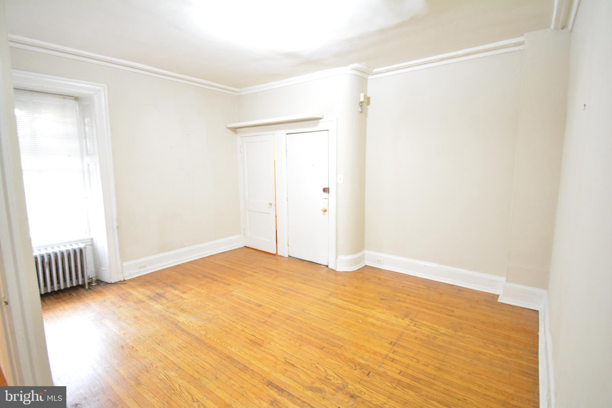 235 West Rittenhouse Street, Unit 1B Philadelphia, PA 19144 - Photo 1 of 9 a view of an empty room