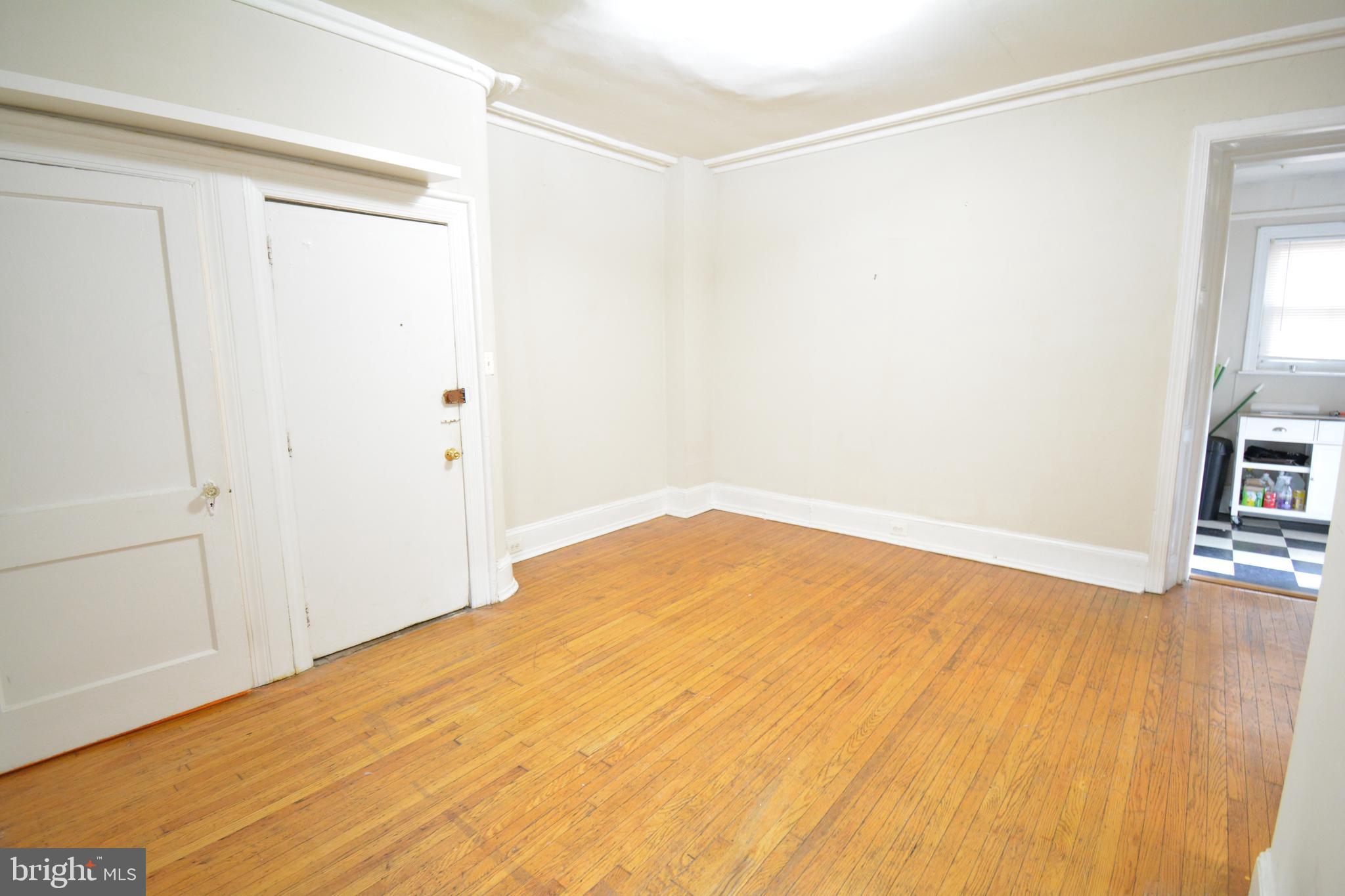 235 West Rittenhouse Street, Unit 1B Philadelphia, PA 19144 - Photo 2 of 9 a view of empty room with wooden floor