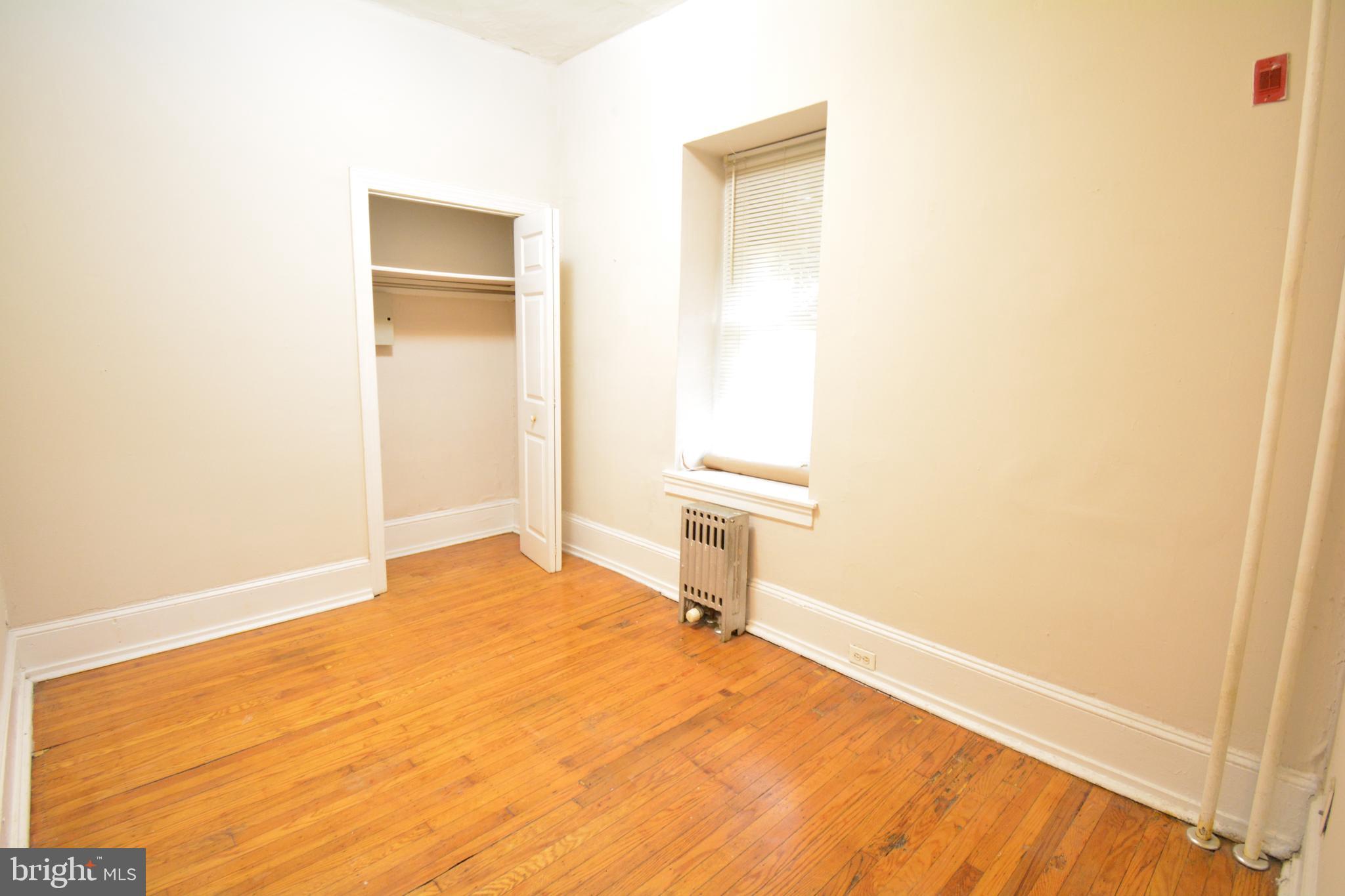 235 West Rittenhouse Street, Unit 1B Philadelphia, PA 19144 - Photo 4 of 9 a bathroom with a toilet
