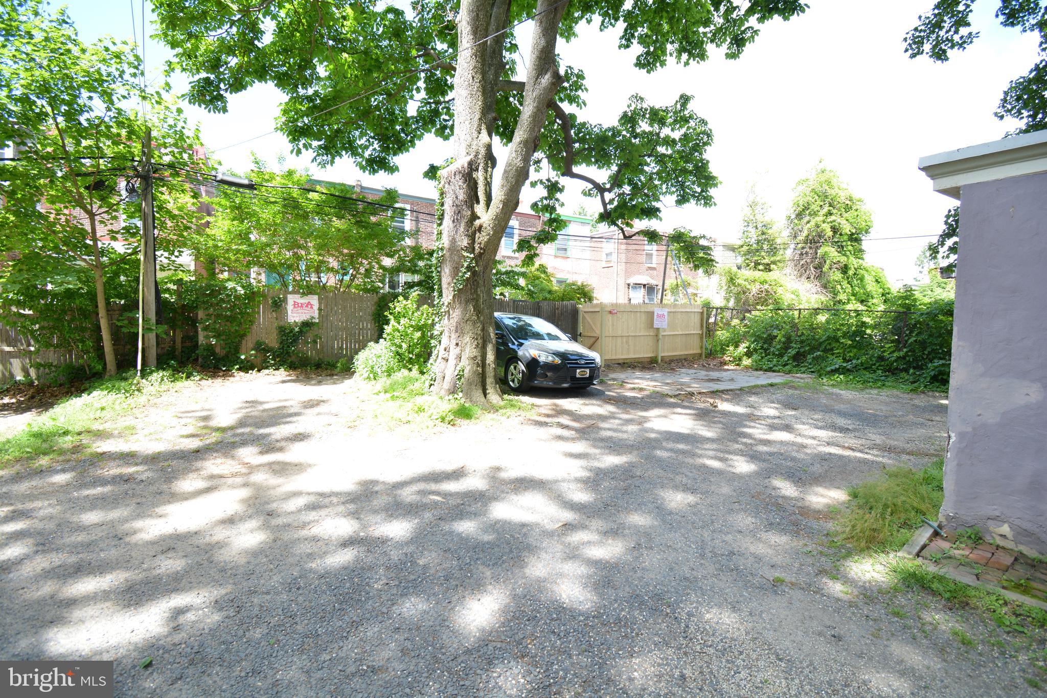 235 West Rittenhouse Street, Unit 1B Philadelphia, PA 19144 - Photo 7 of 9 a view of a tree in front of a house