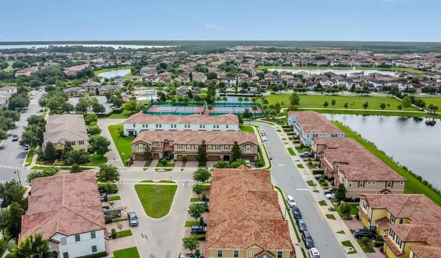 an aerial view of a house with a garden
