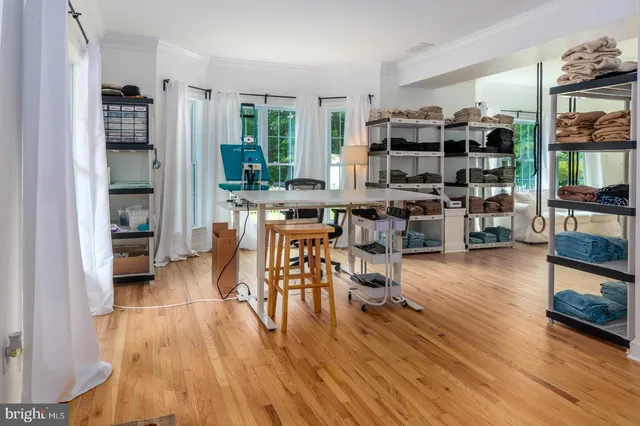 a view of a living room kitchen and dining room