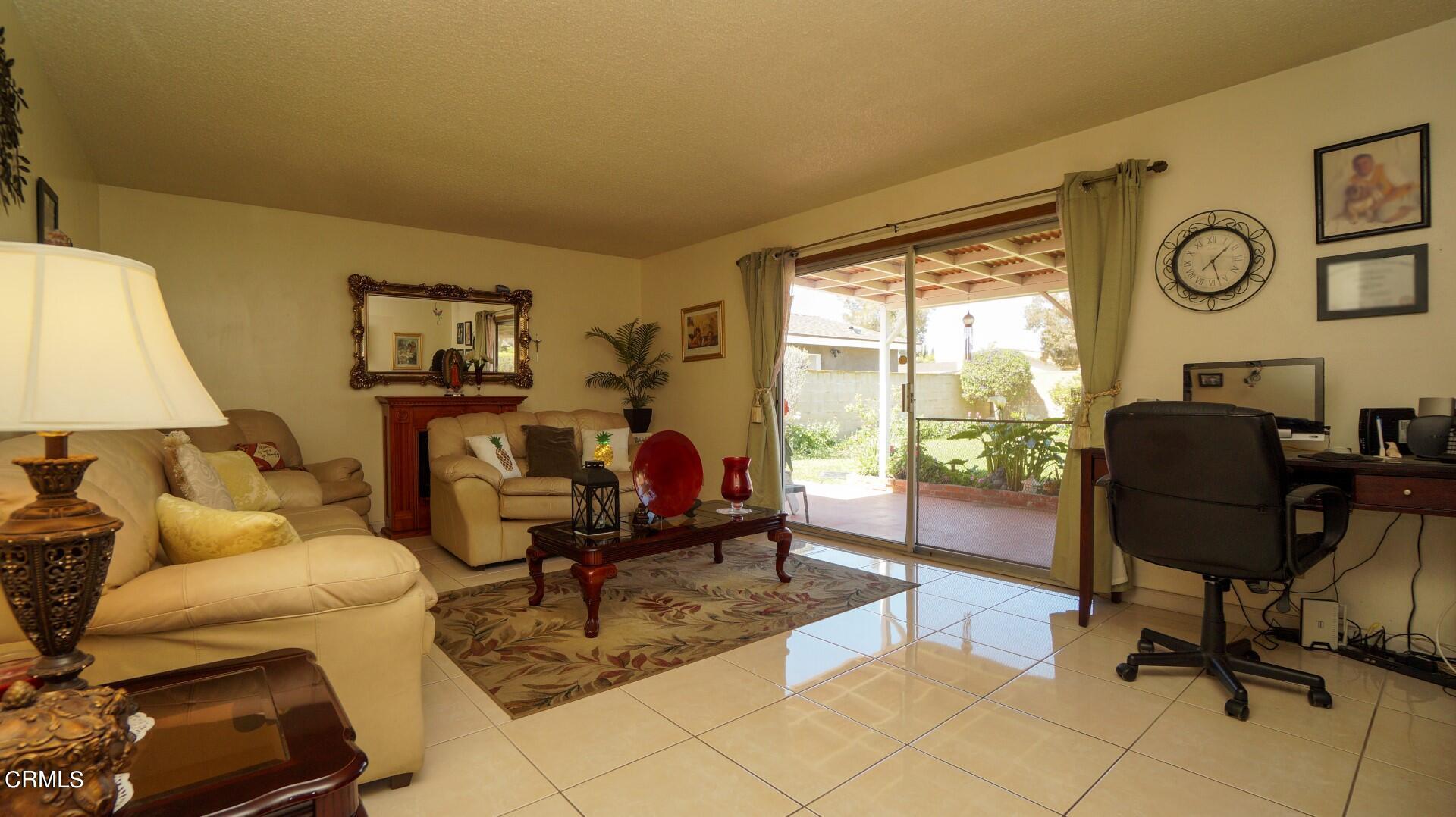 1121 Yale Street Oxnard, CA 93033 - Photo 8 of 22 a living room with furniture and a window