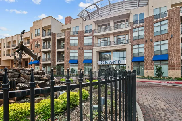 a city street lined with tall buildings