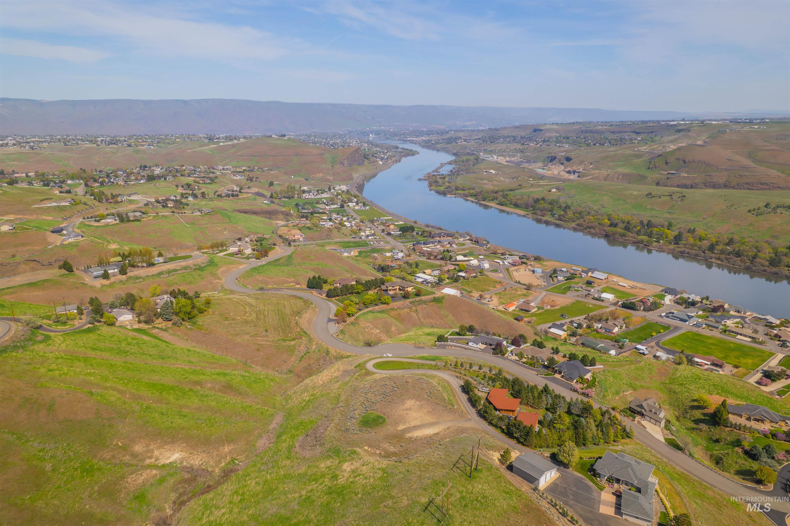 1780 Cherry Street Clarkston, WA 99403 - Photo 1 of 19 Aerial view of residential area featuring a large body of water