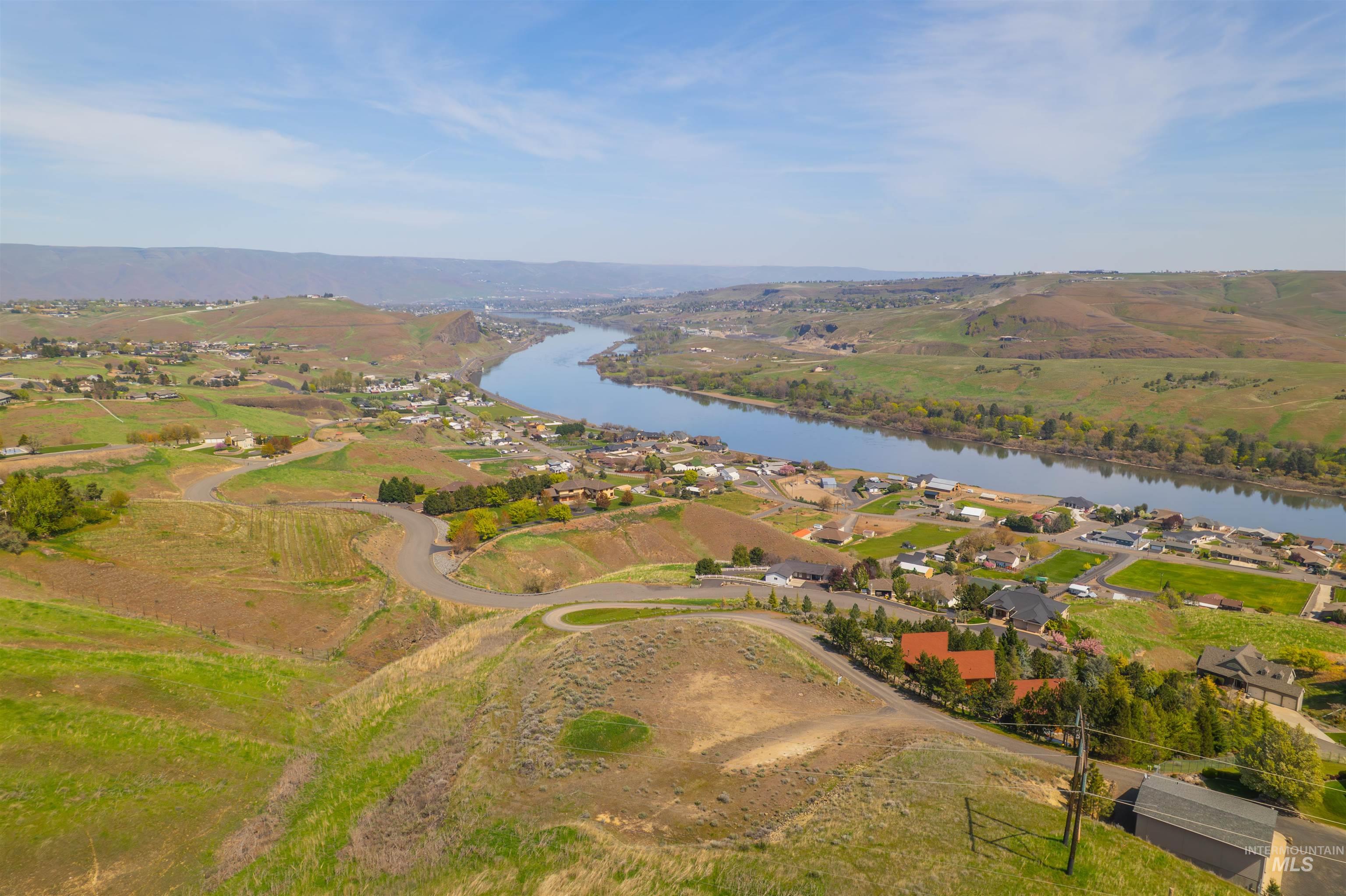 1780 Cherry Street Clarkston, WA 99403 - Photo 13 of 19 Aerial view of residential area with a large body of water