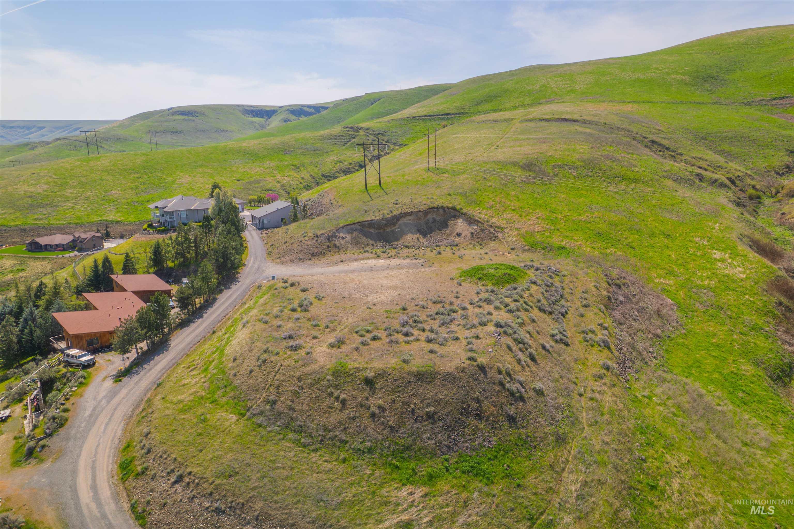 1780 Cherry Street Clarkston, WA 99403 - Photo 3 of 19 Aerial view of sparsely populated area with mountains