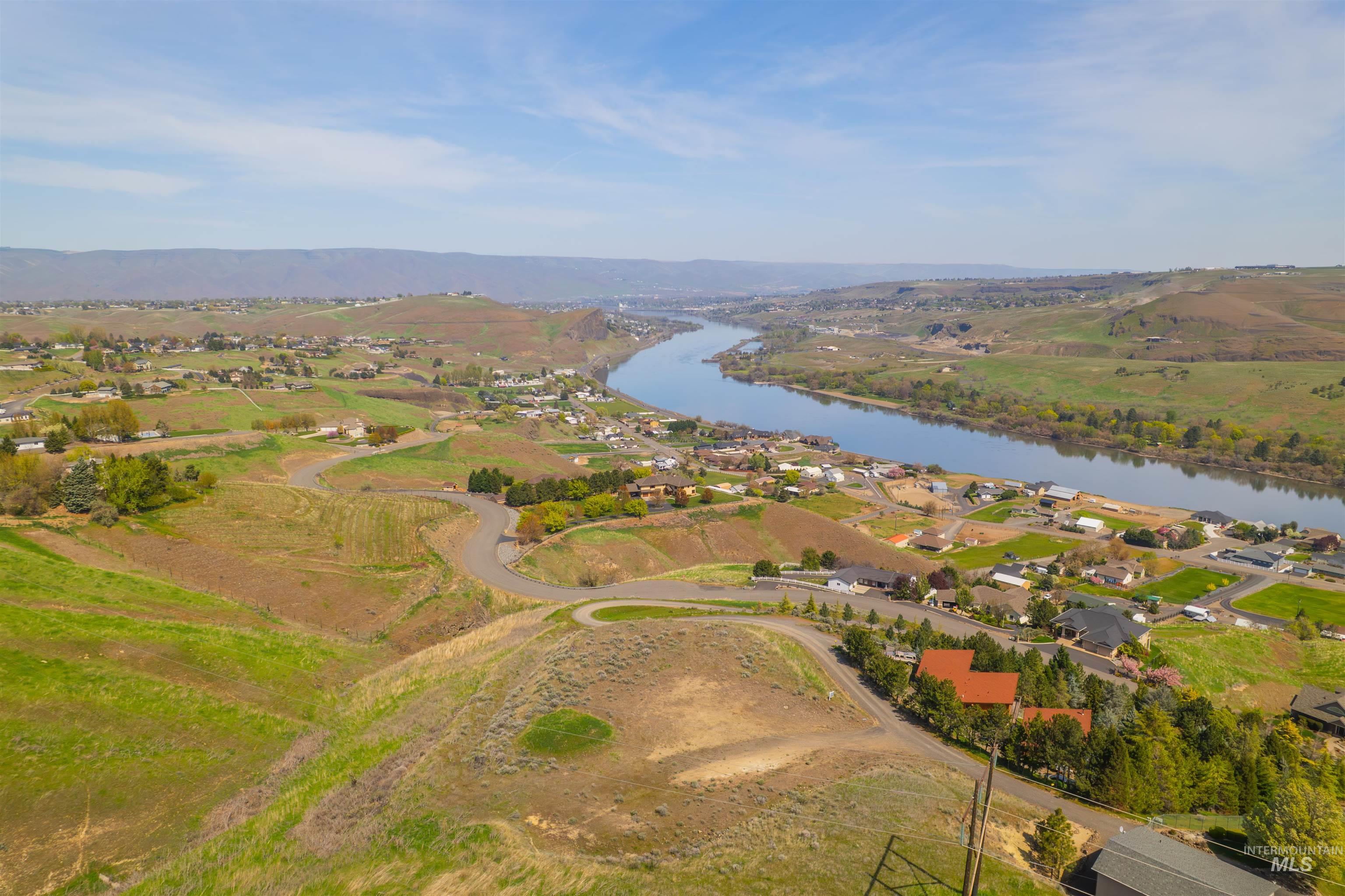 1780 Cherry Street Clarkston, WA 99403 - Photo 5 of 19 Aerial perspective of suburban area with a nearby body of water