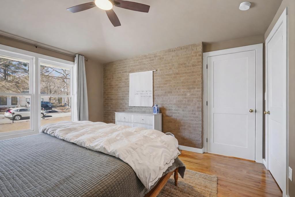 177 Kirkpatrick Drive Southwest Marietta, GA 30064 - Photo 18 of 37 a bedroom with a bed and a large window