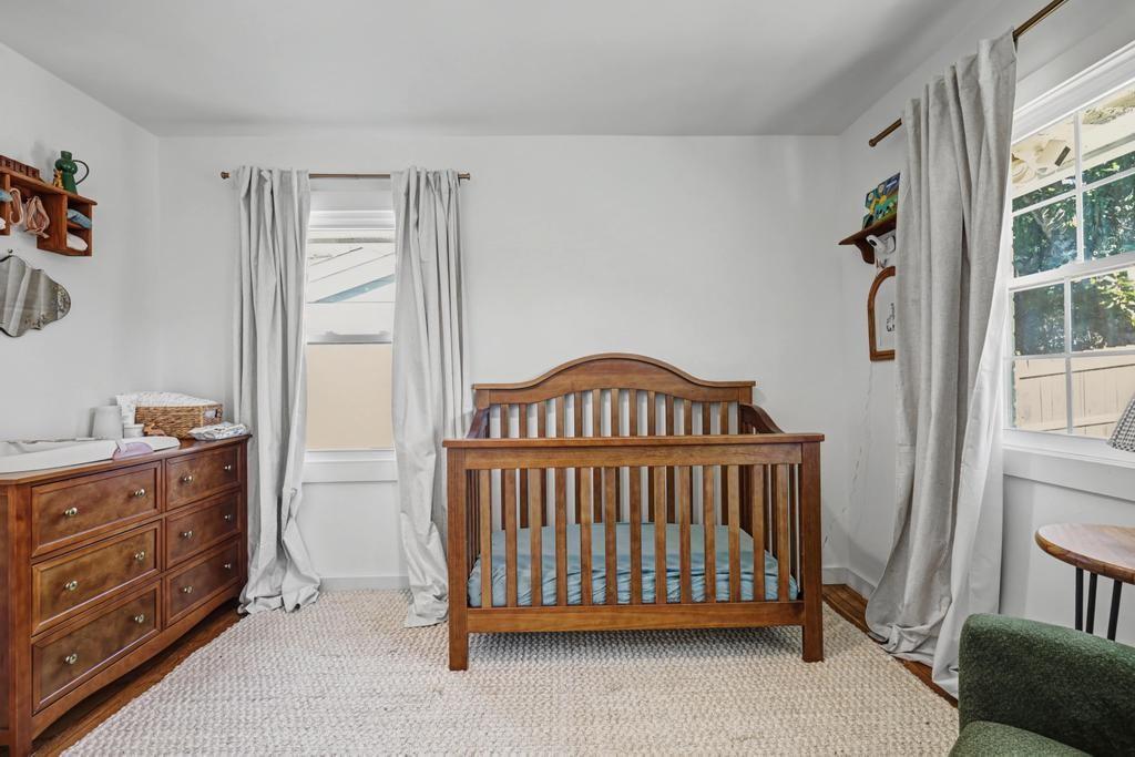 177 Kirkpatrick Drive Southwest Marietta, GA 30064 - Photo 22 of 37 a bedroom with a bed and a window