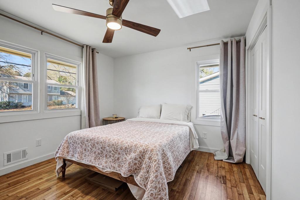 177 Kirkpatrick Drive Southwest Marietta, GA 30064 - Photo 24 of 37 a bedroom with a bed and wooden floor