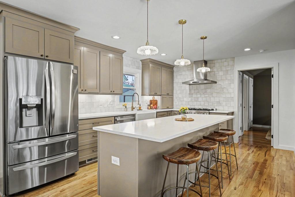 177 Kirkpatrick Drive Southwest Marietta, GA 30064 - Photo 9 of 37 a kitchen with kitchen island a sink appliances and cabinets