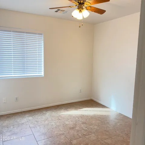 a bathroom with a sink a toilet a mirror and vanity
