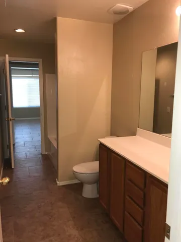 a bathroom with a sink and a toilet