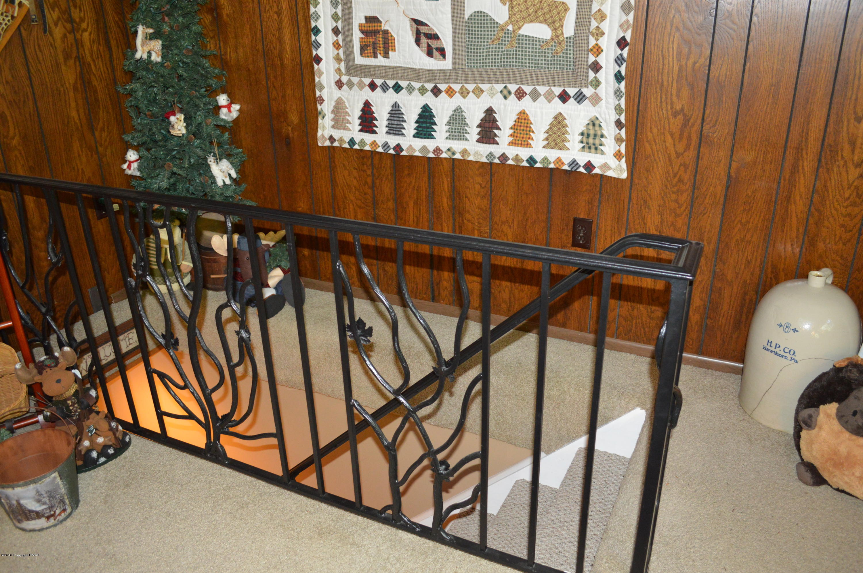 164 Deppners Road Blakeslee, PA 18610 - Photo 14 of 28 Living rm stairway to family rm