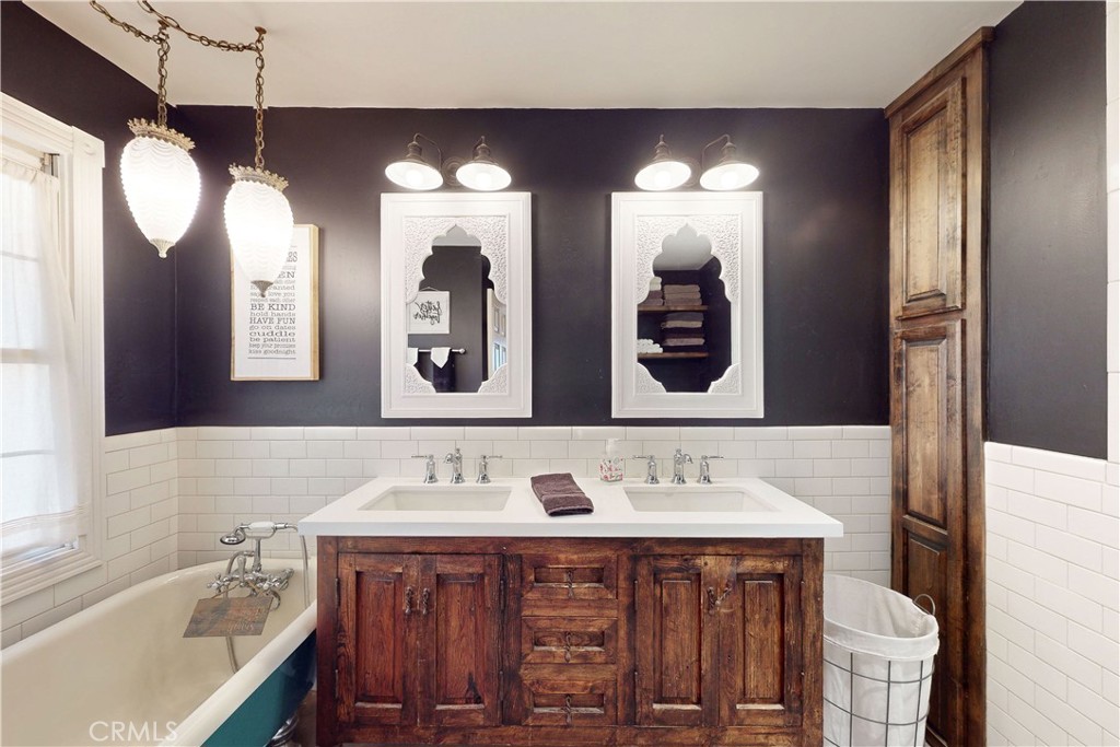 1473 Willow Road Nipomo, CA 93444 - Photo 27 of 52 a bathroom with a sink and a mirror