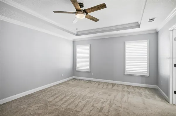 a view of an empty room and window