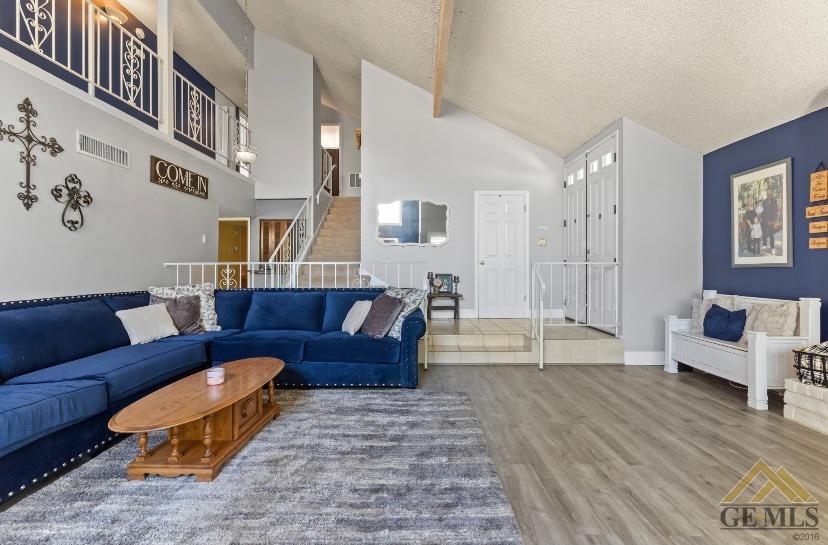 Undisclosed Address Bakersfield, CA 93309 - Photo 3 of 18 a living room with furniture and a couch